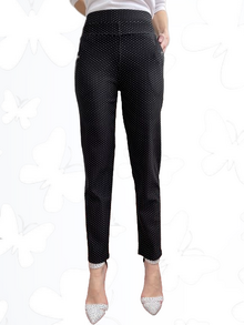Клин-панталон, много еластична материя, два предни джоба, цвят черен на ситни бели точки